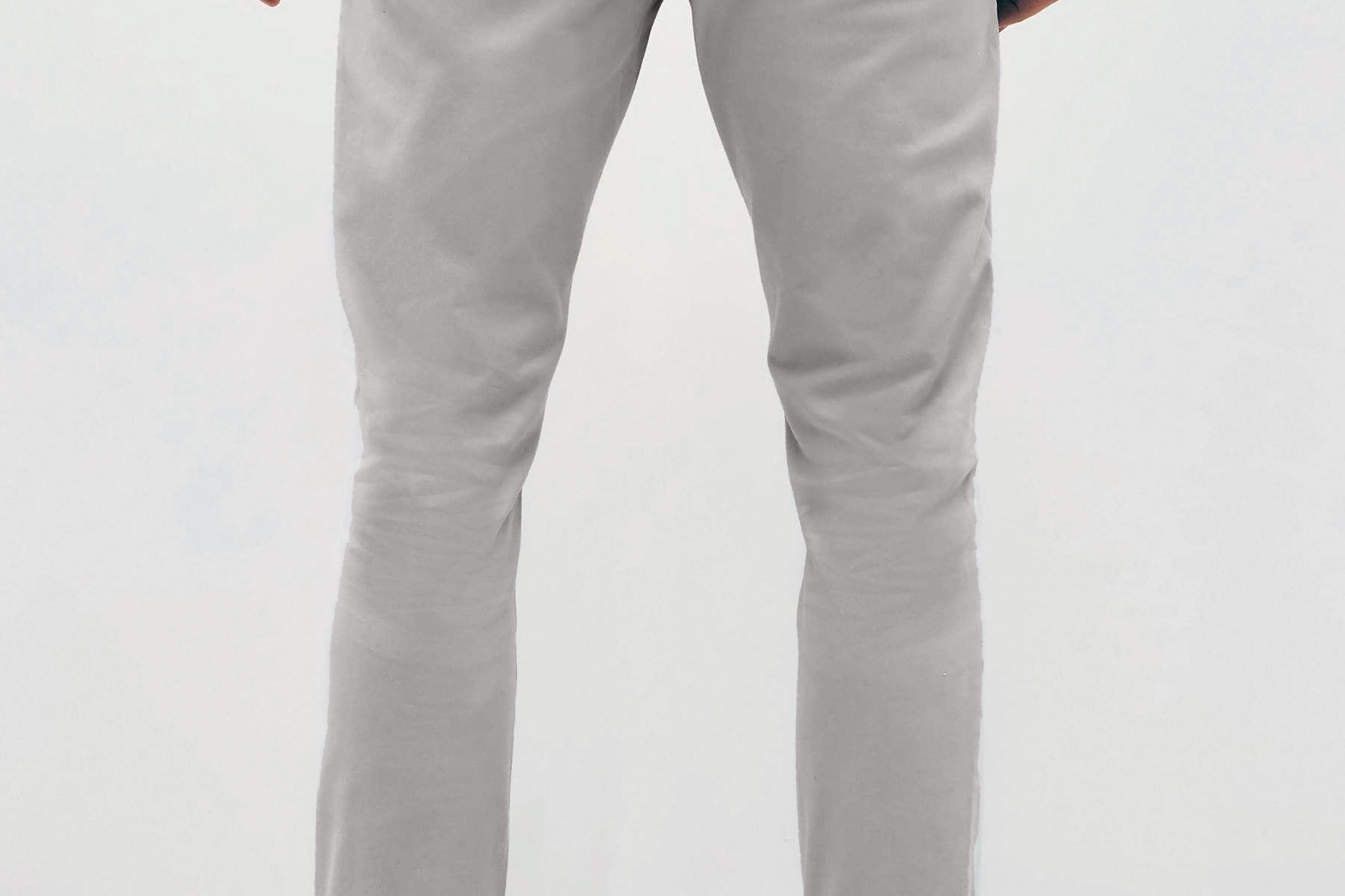 Mens Silver Grey chinos with front slanted pockets, jetted back pockets. zip fly fastening and brown horne buttons on the waistband and back pockets, the fit is a slim fit, this is worn with a white tee and white unbranded trainers