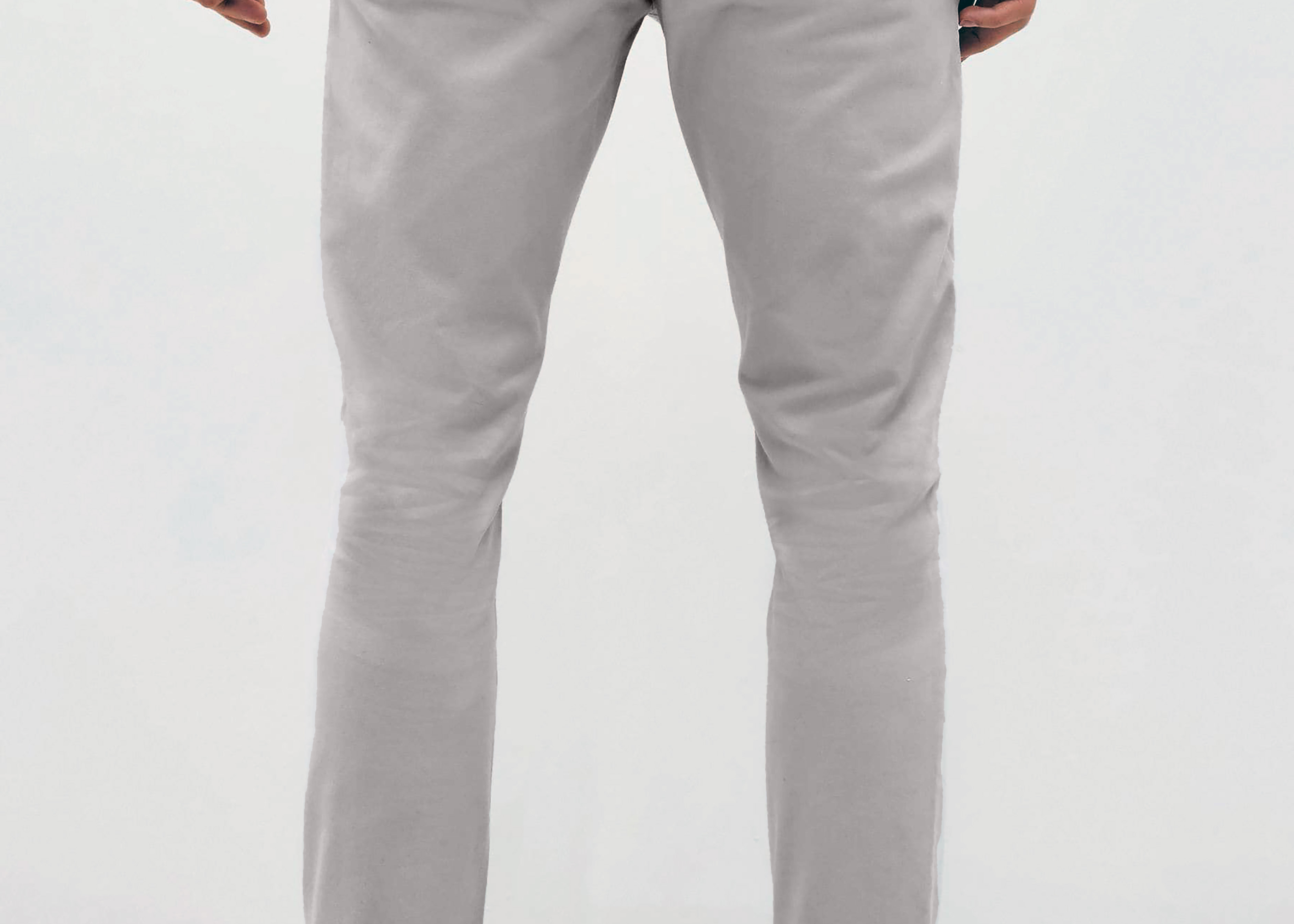 Mens Silver Grey chinos with front slanted pockets, jetted back pockets. zip fly fastening and brown horne buttons on the waistband and back pockets, the fit is a slim fit, this is worn with a white tee and white unbranded trainers