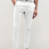 Mens white chinos with front slanted pockets, jetted back pockets. zip fly fastening and brown horne buttons on the waistband and back pockets, the fit is a slim fit, this is worn with a white tee and white unbranded trainers