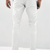 Mens white chinos with front slanted pockets, jetted back pockets. zip fly fastening and brown horne buttons on the waistband and back pockets, the fit is a slim fit, this is worn with a white tee and white unbranded trainers