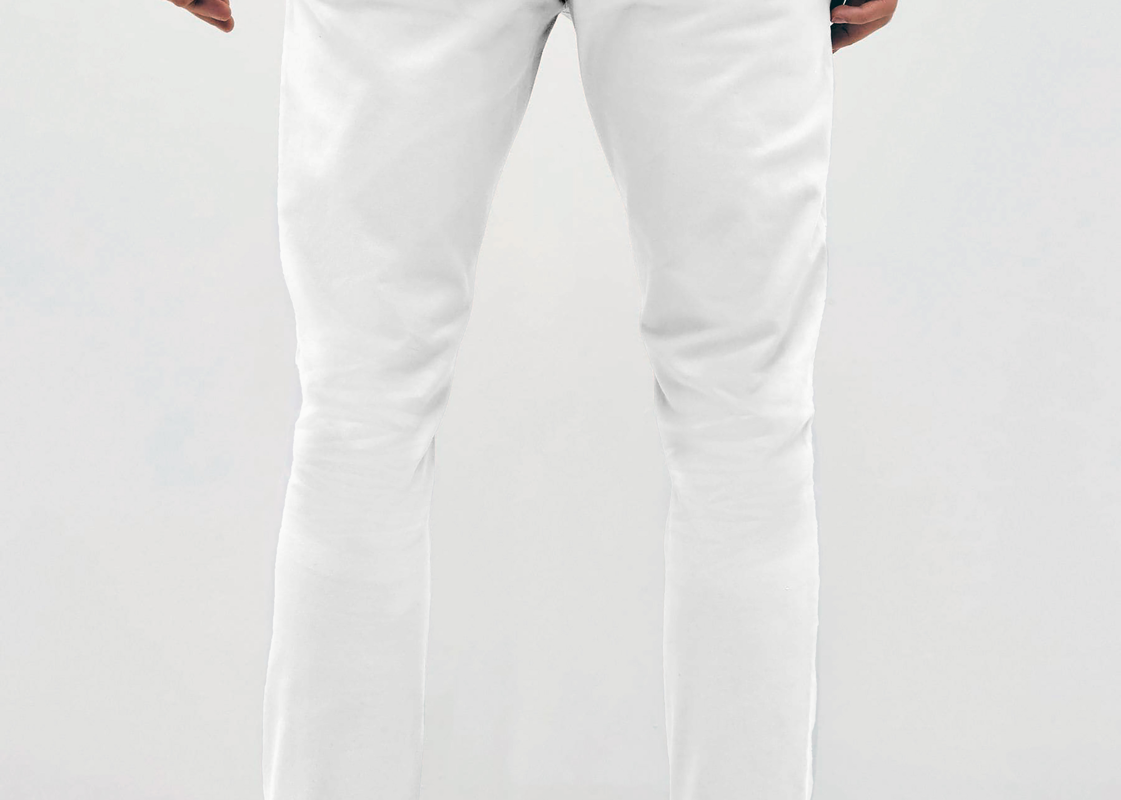 Mens white chinos with front slanted pockets, jetted back pockets. zip fly fastening and brown horne buttons on the waistband and back pockets, the fit is a slim fit, this is worn with a white tee and white unbranded trainers