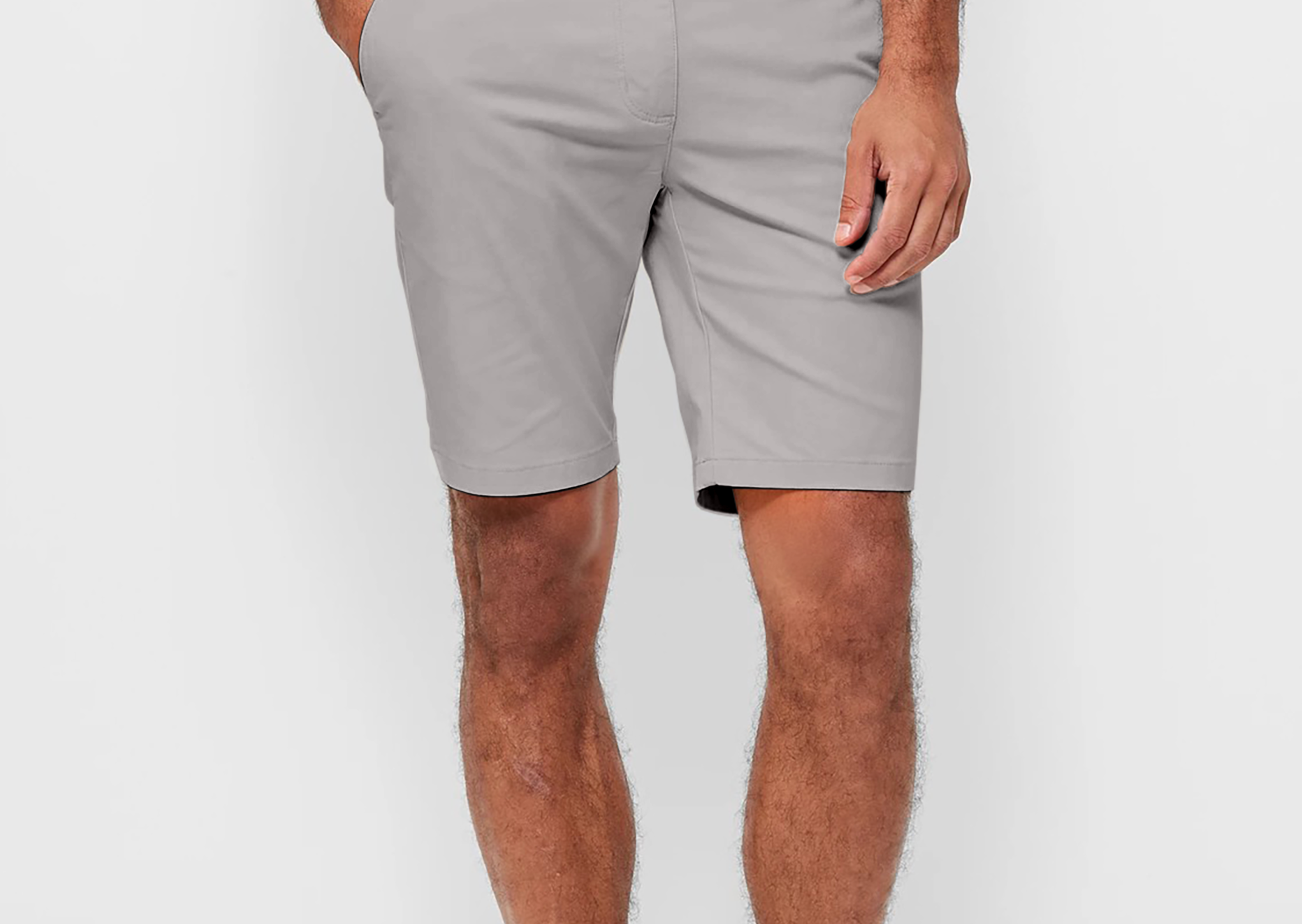 Mens Silver Grey chinos shorts with front slanted pockets, jetted back pockets. zip fly fastening and brown horne buttons on the waistband and back pockets, the fit is a slim fit, this is worn with a white tee and white t-shirt