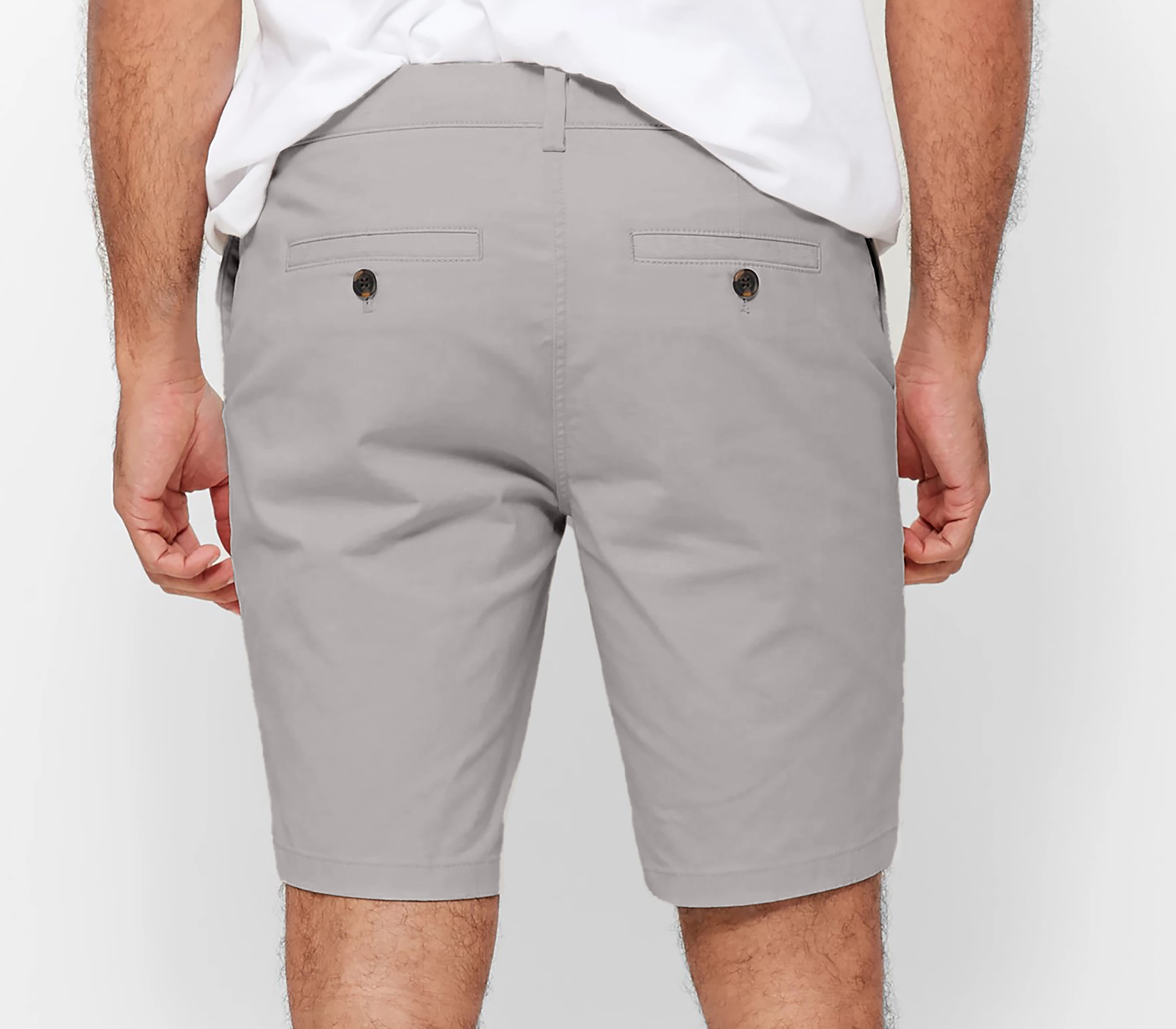 Mens Silver Grey chinos shorts with front slanted pockets, jetted back pockets. zip fly fastening and brown horne buttons on the waistband and back pockets, the fit is a slim fit, this is worn with a white tee and white t-shirt