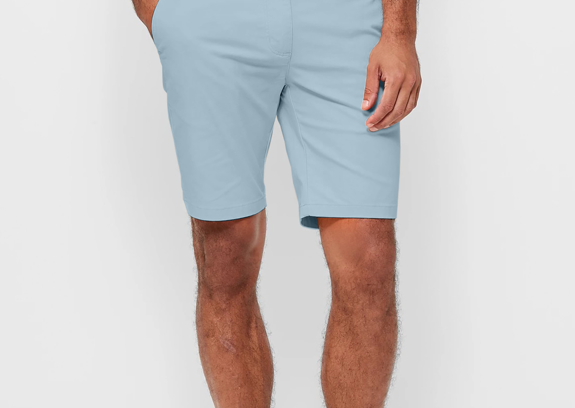 Mens Sky Blue chinos shorts with front slanted pockets, jetted back pockets. zip fly fastening and brown horne buttons on the waistband and back pockets, the fit is a slim fit, this is worn with a white tee and white t-shirt