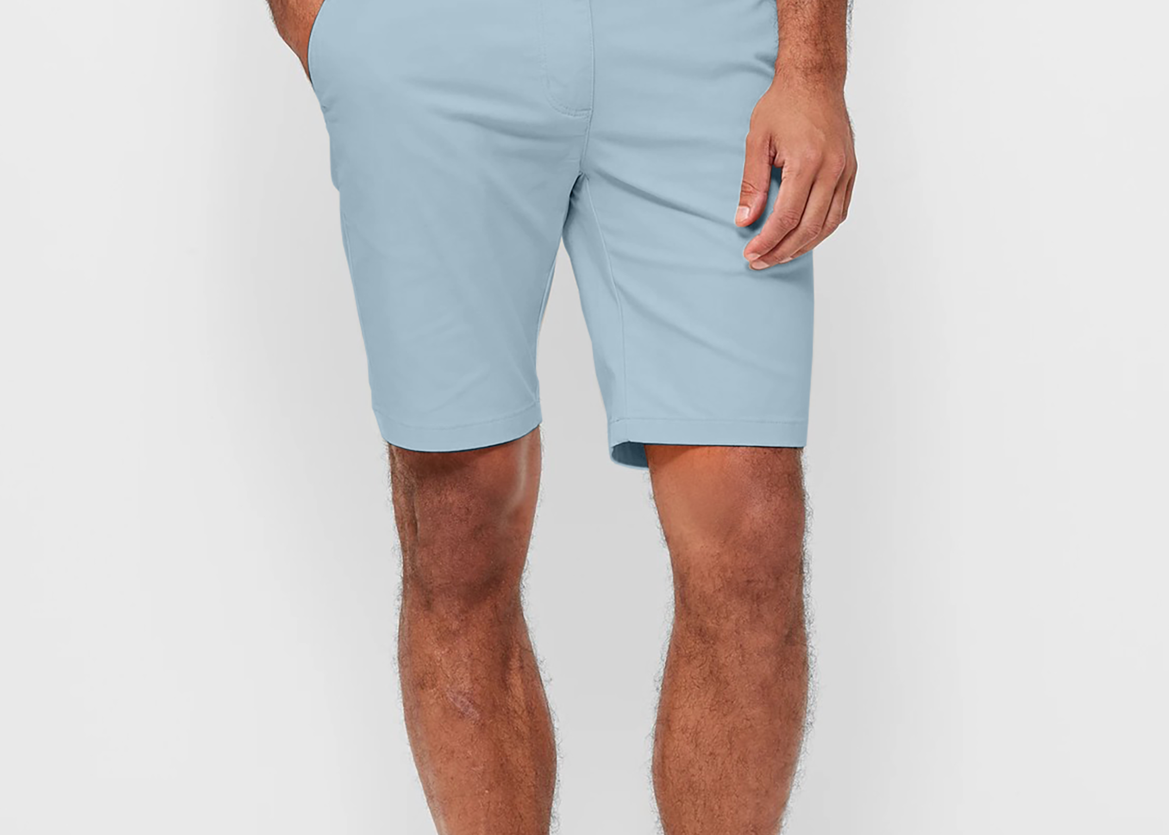 Mens Sky Blue chinos shorts with front slanted pockets, jetted back pockets. zip fly fastening and brown horne buttons on the waistband and back pockets, the fit is a slim fit, this is worn with a white tee and white t-shirt