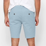 Mens Sky Blue chinos shorts with front slanted pockets, jetted back pockets. zip fly fastening and brown horne buttons on the waistband and back pockets, the fit is a slim fit, this is worn with a white tee and white t-shirt